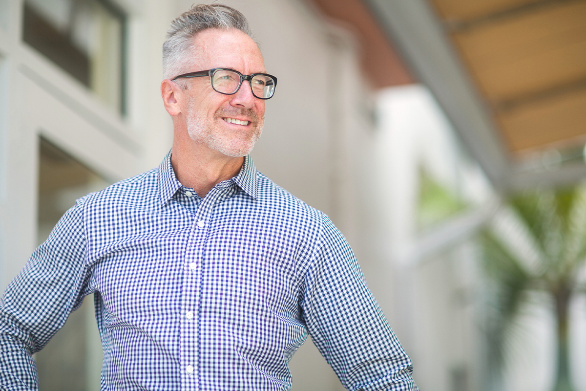 Handsome man with dental implants from BioDental in Encino.