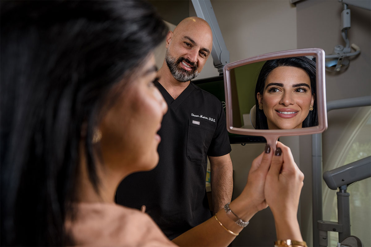 Smiling Encino woman after receiving Invisalign aligners at BioDental.